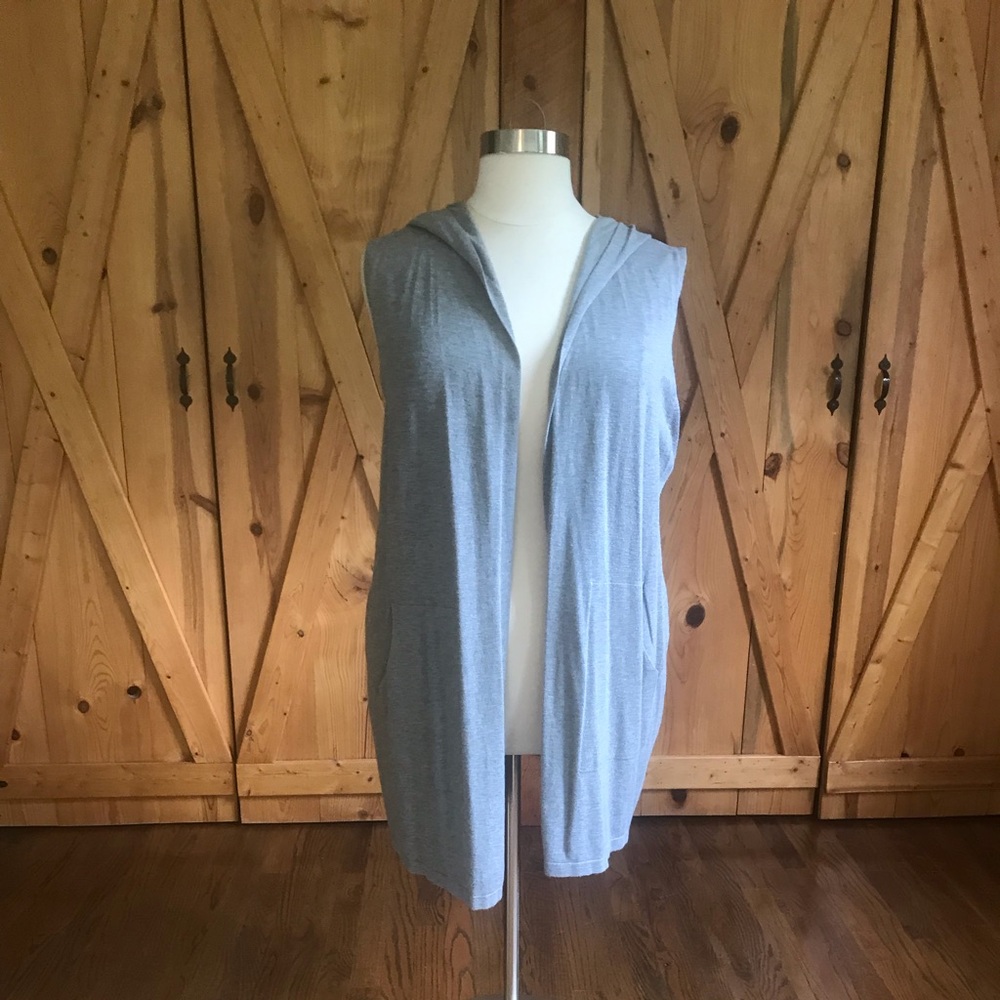 Duster length knit vest with hood